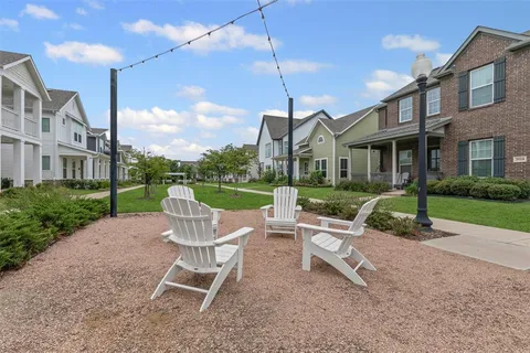 an aerial view of a city with lots of residential buildings