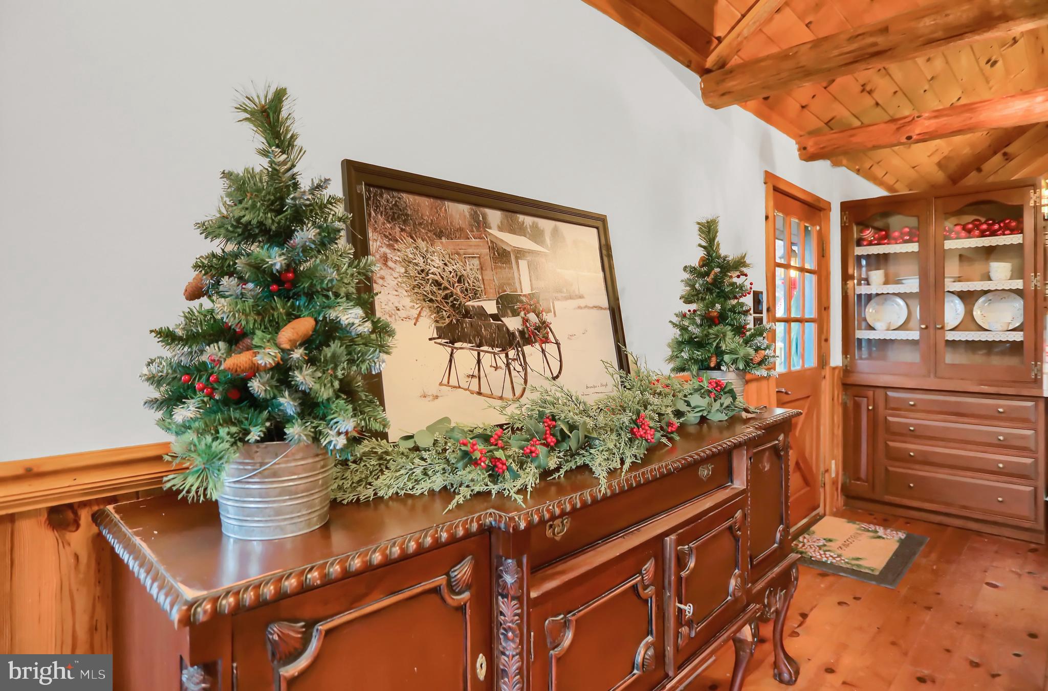 2716 Whitesel Road James Creek, PA 16657 - Photo 27 of 66 a vase of flowers sitting on a floor