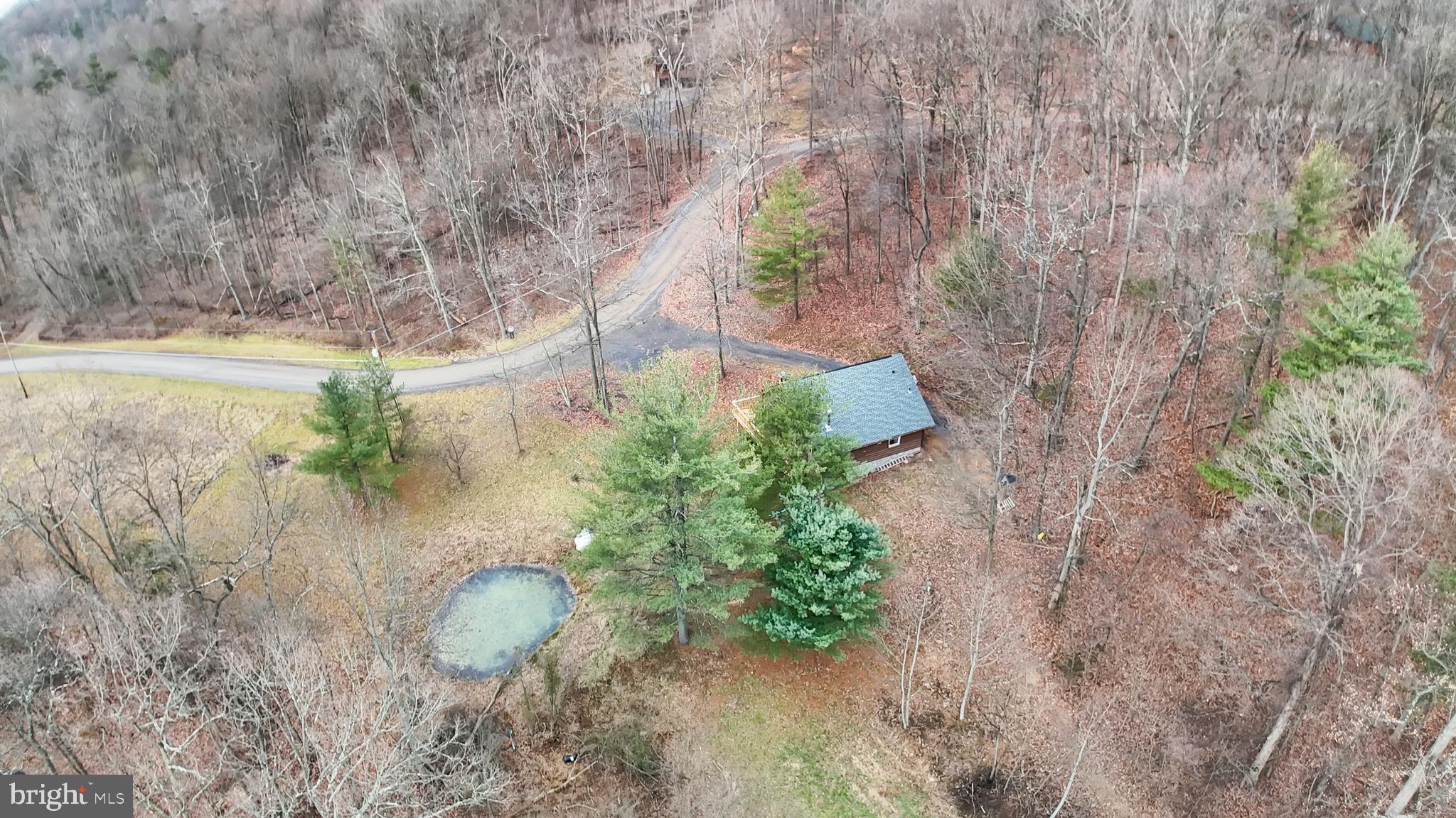 2716 Whitesel Road James Creek, PA 16657 - Photo 60 of 66 a view of a lake with lots of trees