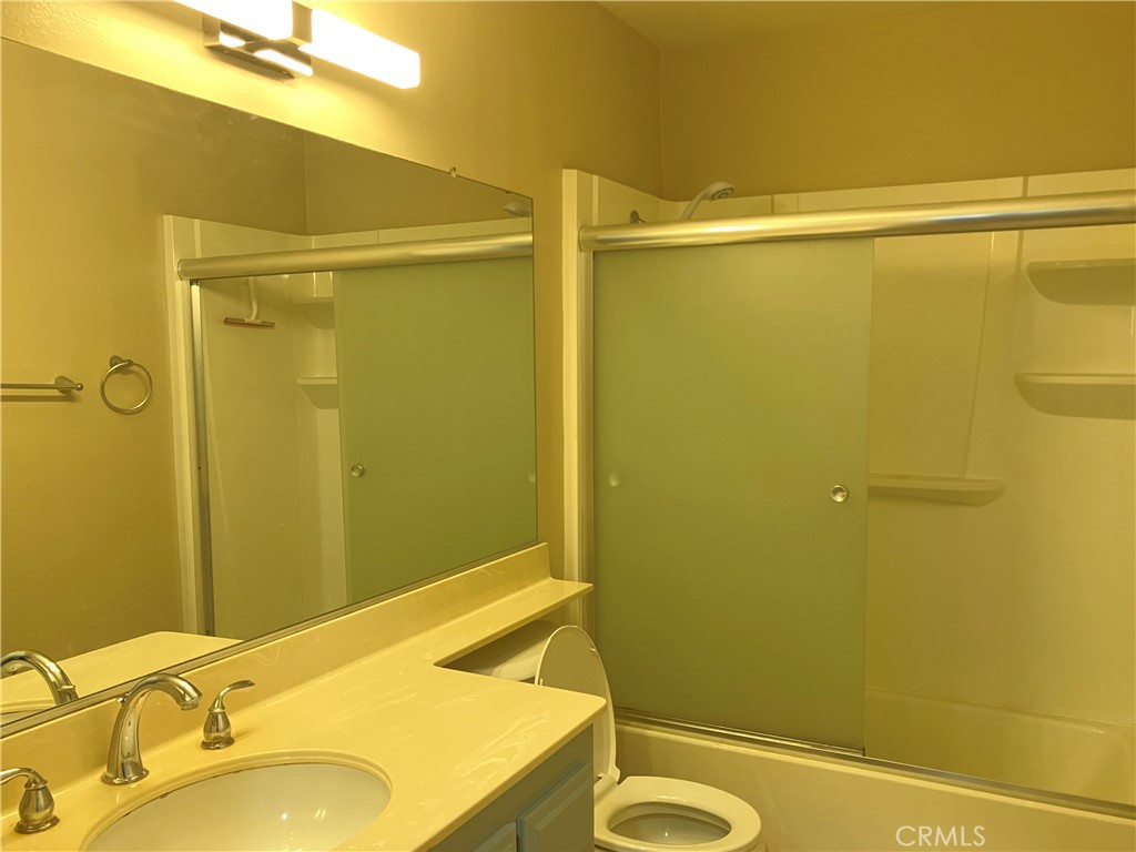 19933 Ralph Street Walnut, CA 91789 - Photo 49 of 77 a bathroom with a sink mirror and a shower