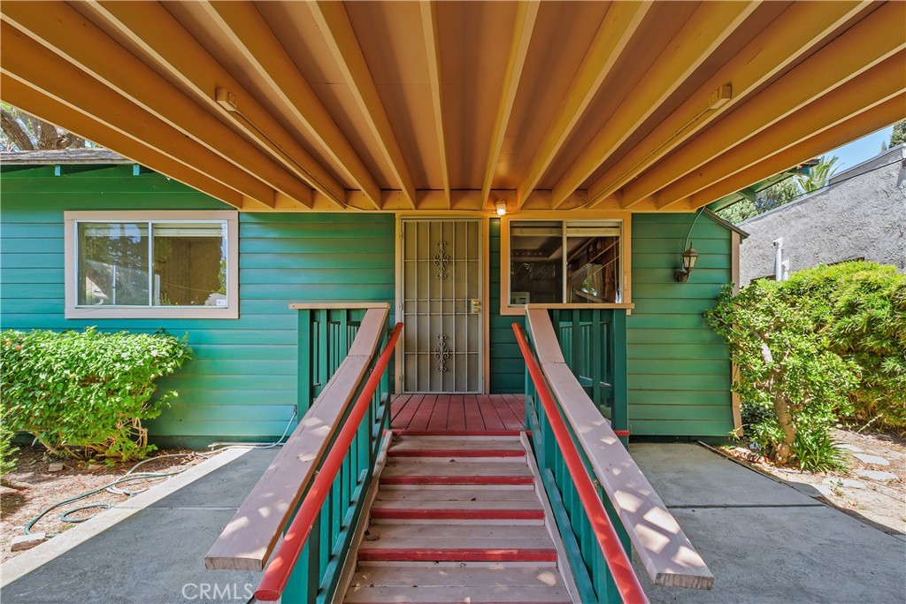 3892 Oakwood Place Riverside, CA 92506 - Photo 26 of 36 The back patio has a covered area and easy access stairs.