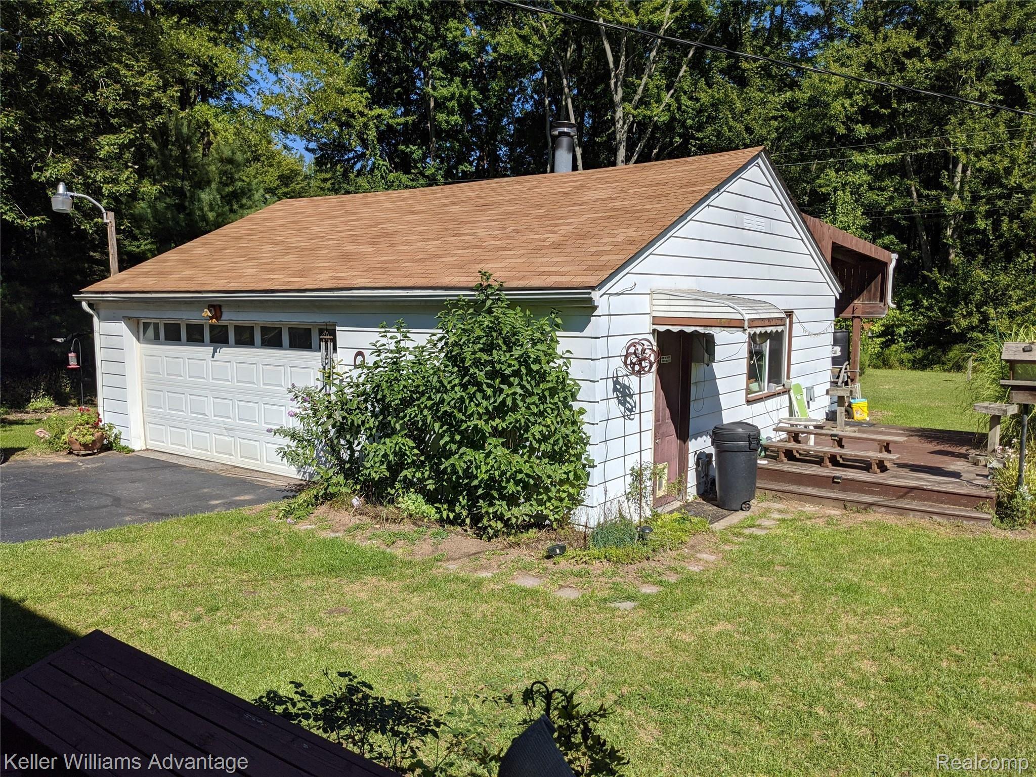 38360 Judd Road Belleville, MI 48111 - Photo 23 of 26 Back yard garage view
