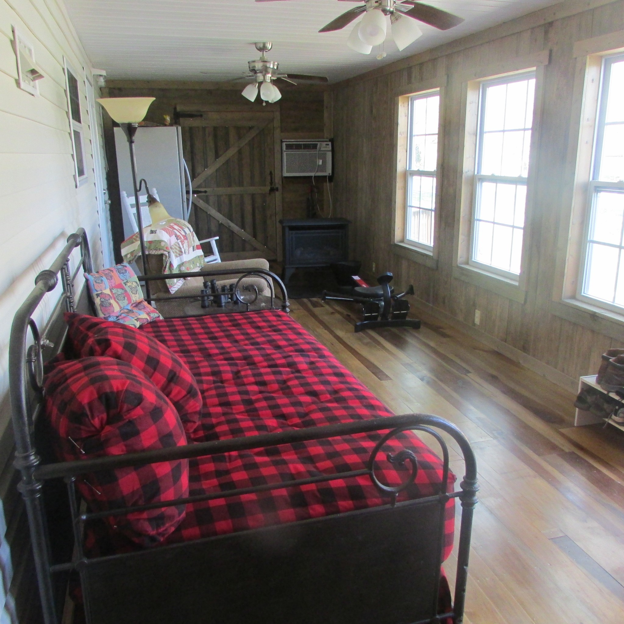 75 Snell Road Ethridge, TN 38456 - Photo 17 of 51 a bed sitting in a bedroom next to a window