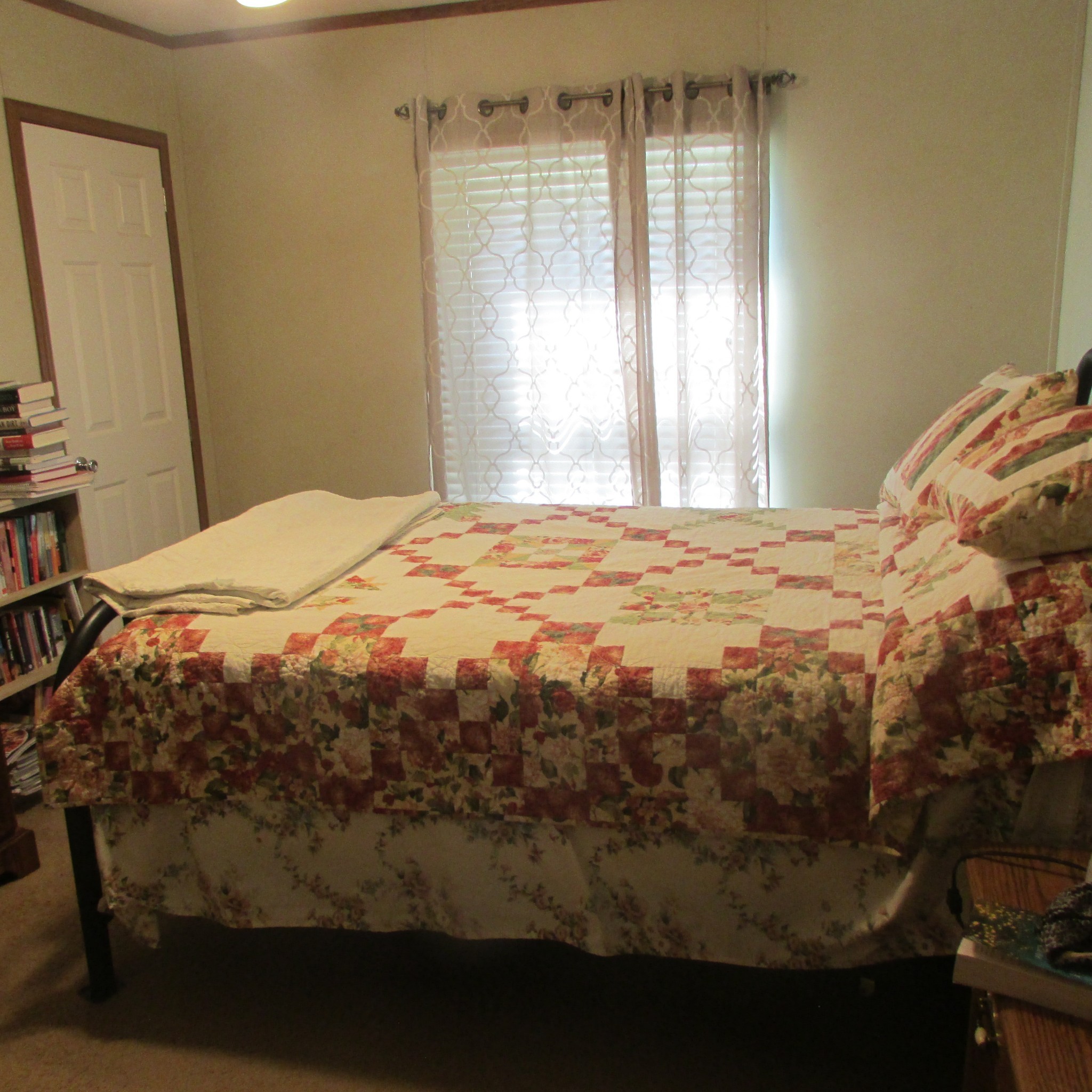 75 Snell Road Ethridge, TN 38456 - Photo 21 of 51 a bedroom with a bed and a window