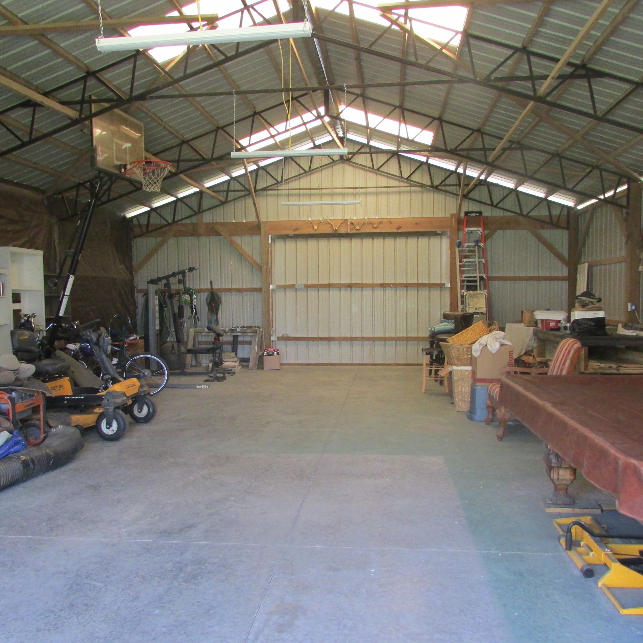 75 Snell Road Ethridge, TN 38456 - Photo 26 of 51 a view of a garage with parked cars