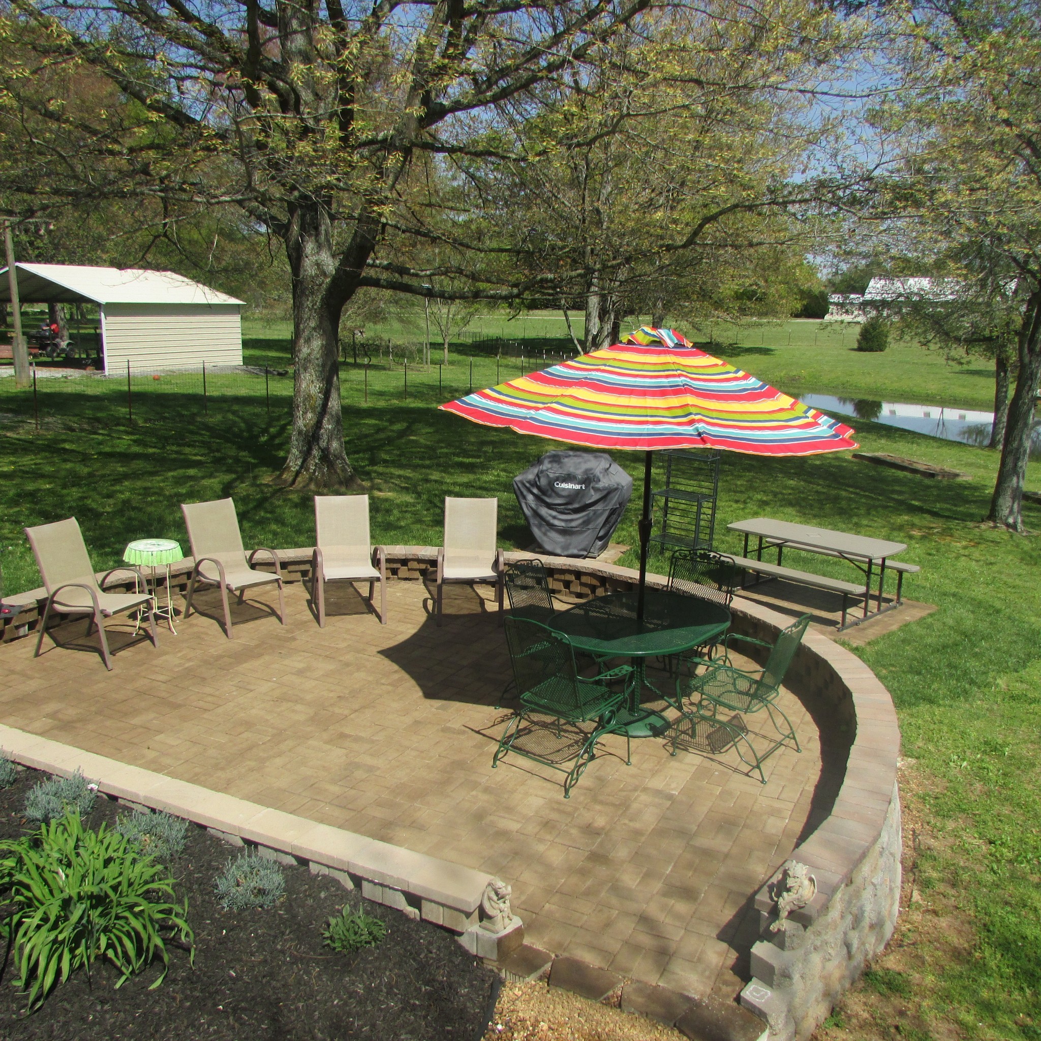 75 Snell Road Ethridge, TN 38456 - Photo 29 of 51 a view of a swimming pool with a patio