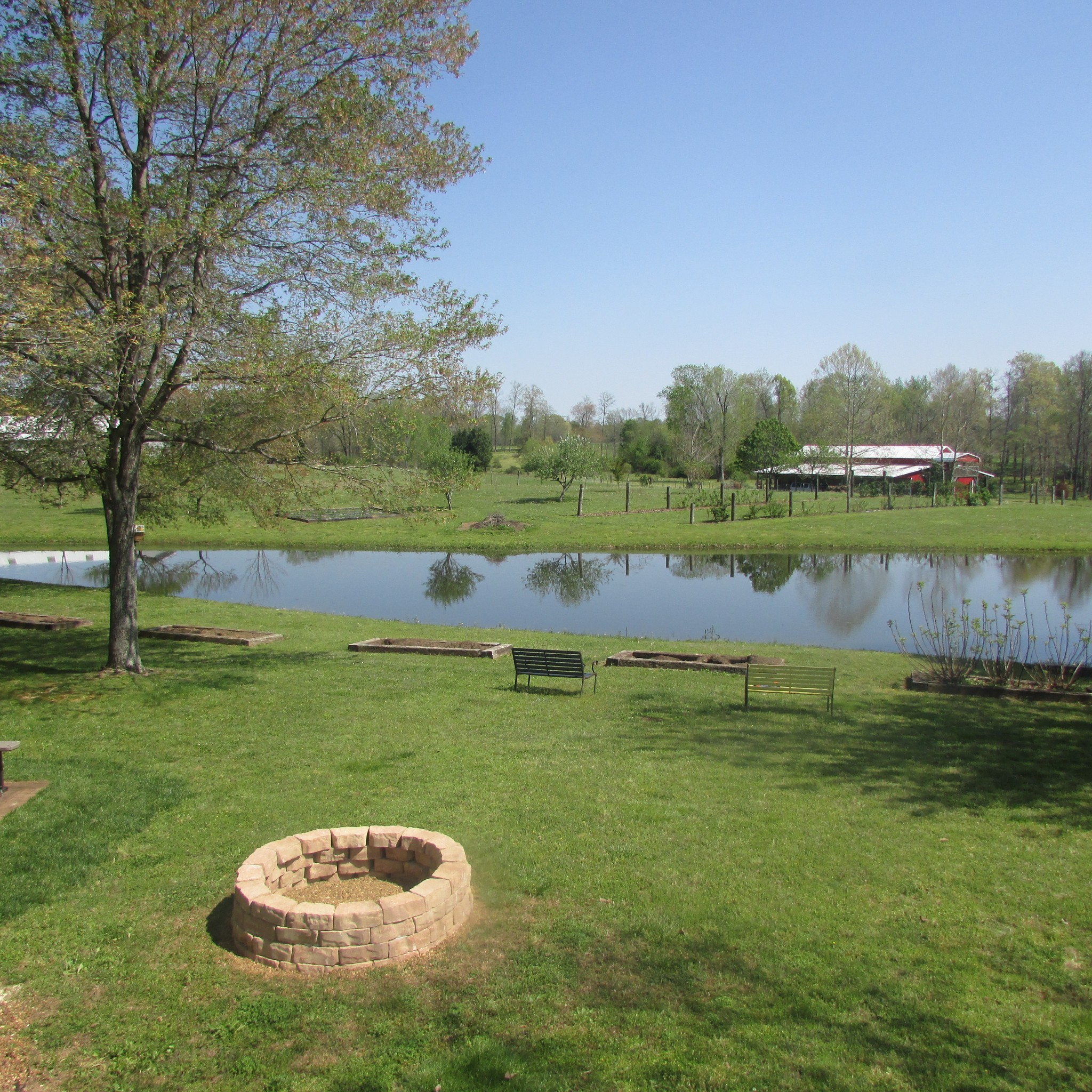 75 Snell Road Ethridge, TN 38456 - Photo 30 of 51 a view of a lake in a garden