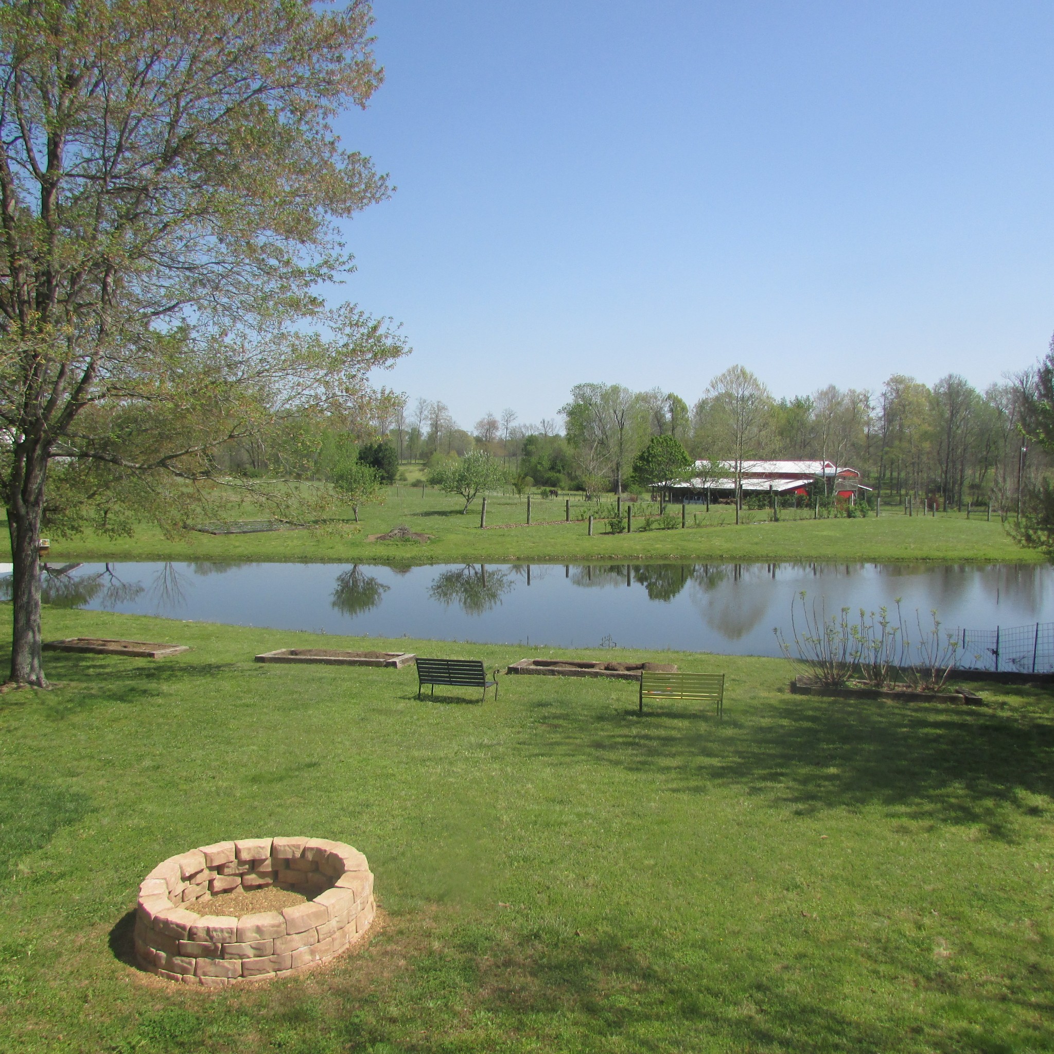 75 Snell Road Ethridge, TN 38456 - Photo 9 of 51 a view of a lake with a big yard
