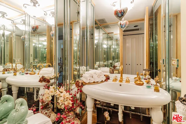 a view of a balcony dining table and chairs