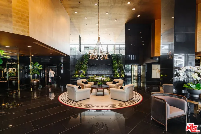 a patio with a table and chairs