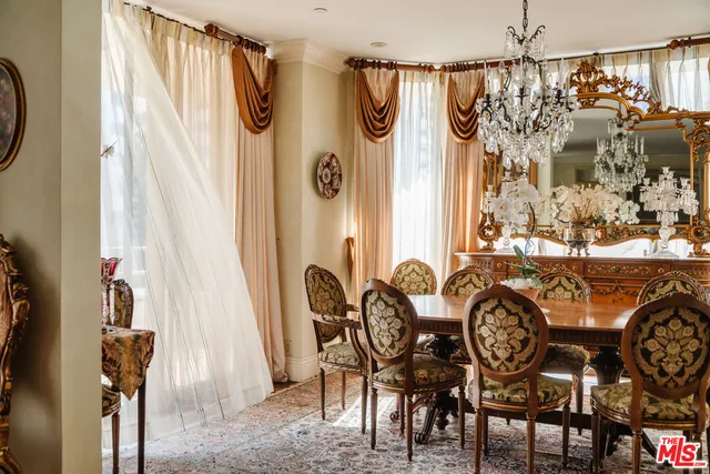 a view of a dining area with furniture window and outside view