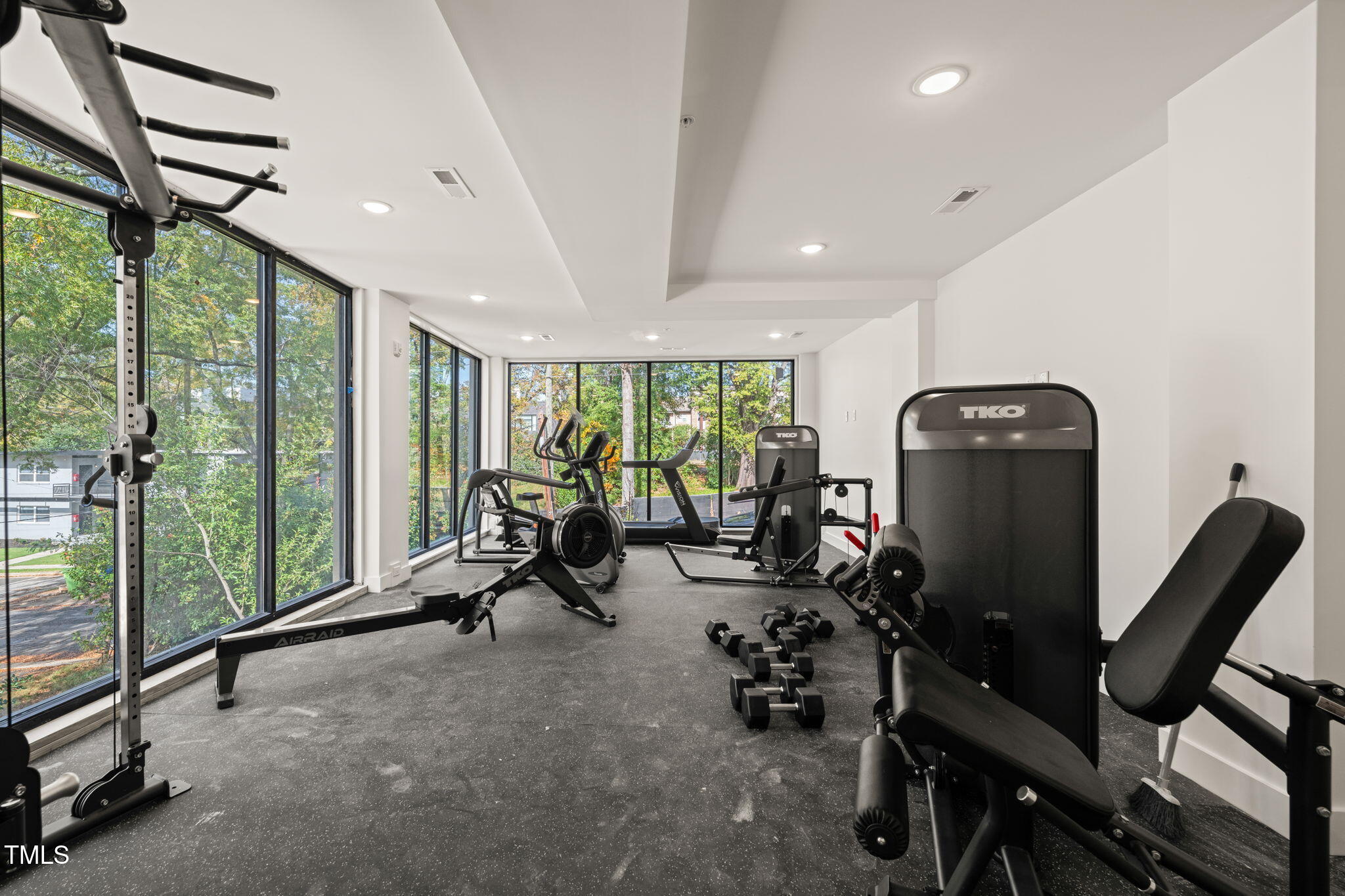 29 Enterprise Street, Unit 201 Raleigh, NC 27607 - Photo 17 of 33 a view of a room with gym equipment