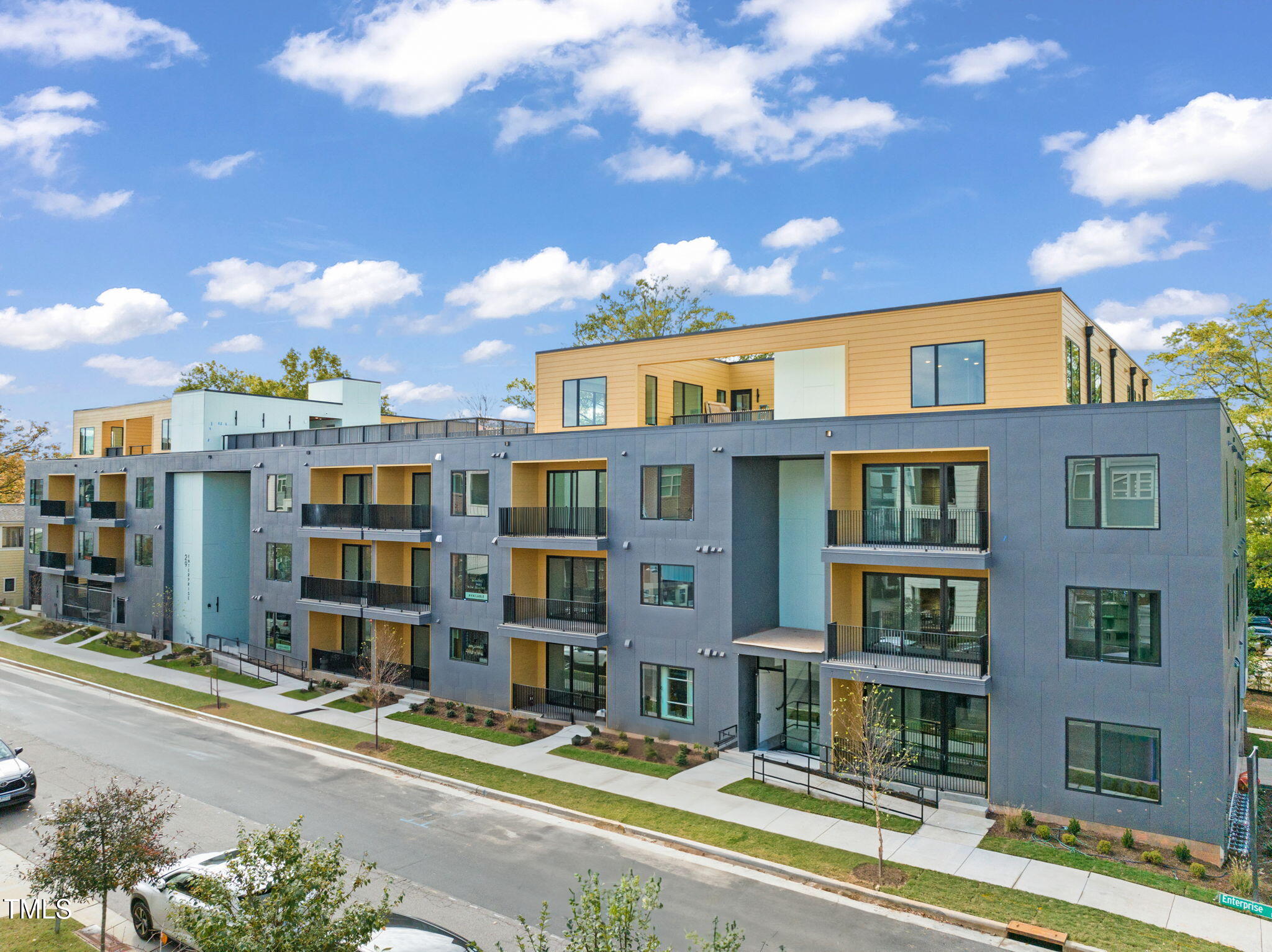 29 Enterprise Street, Unit 201 Raleigh, NC 27607 - Photo 23 of 33 a front view of a multi story residential apartment building