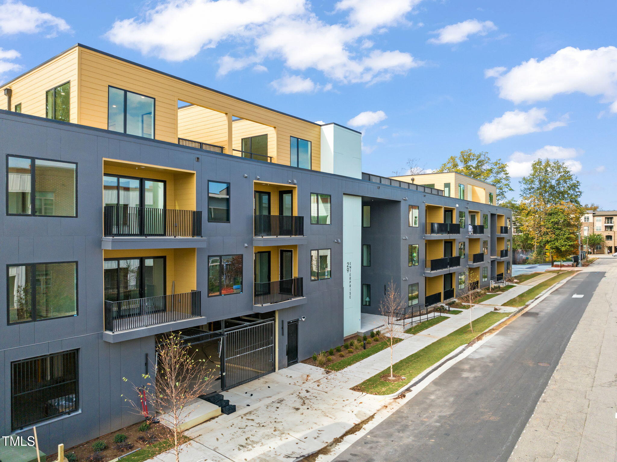 29 Enterprise Street, Unit 201 Raleigh, NC 27607 - Photo 25 of 33 a front view of a multi story building