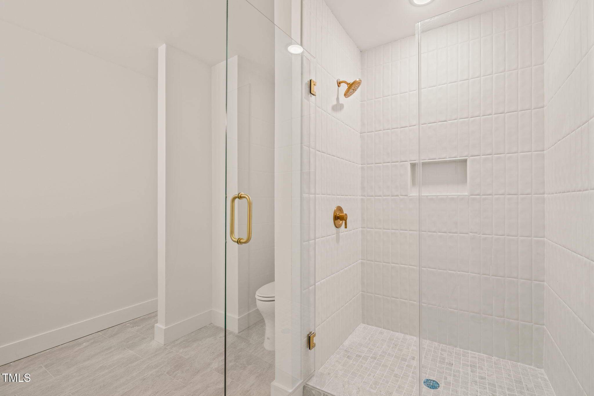 29 Enterprise Street, Unit 201 Raleigh, NC 27607 - Photo 8 of 33 a bathroom with a shower