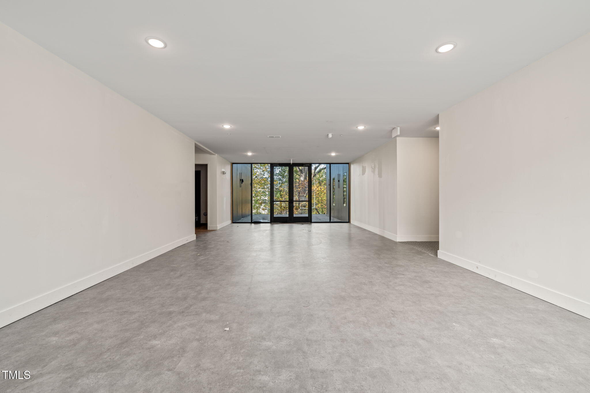 29 Enterprise Street, Unit 201 Raleigh, NC 27607 - Photo 10 of 33 a view of an empty room with a window