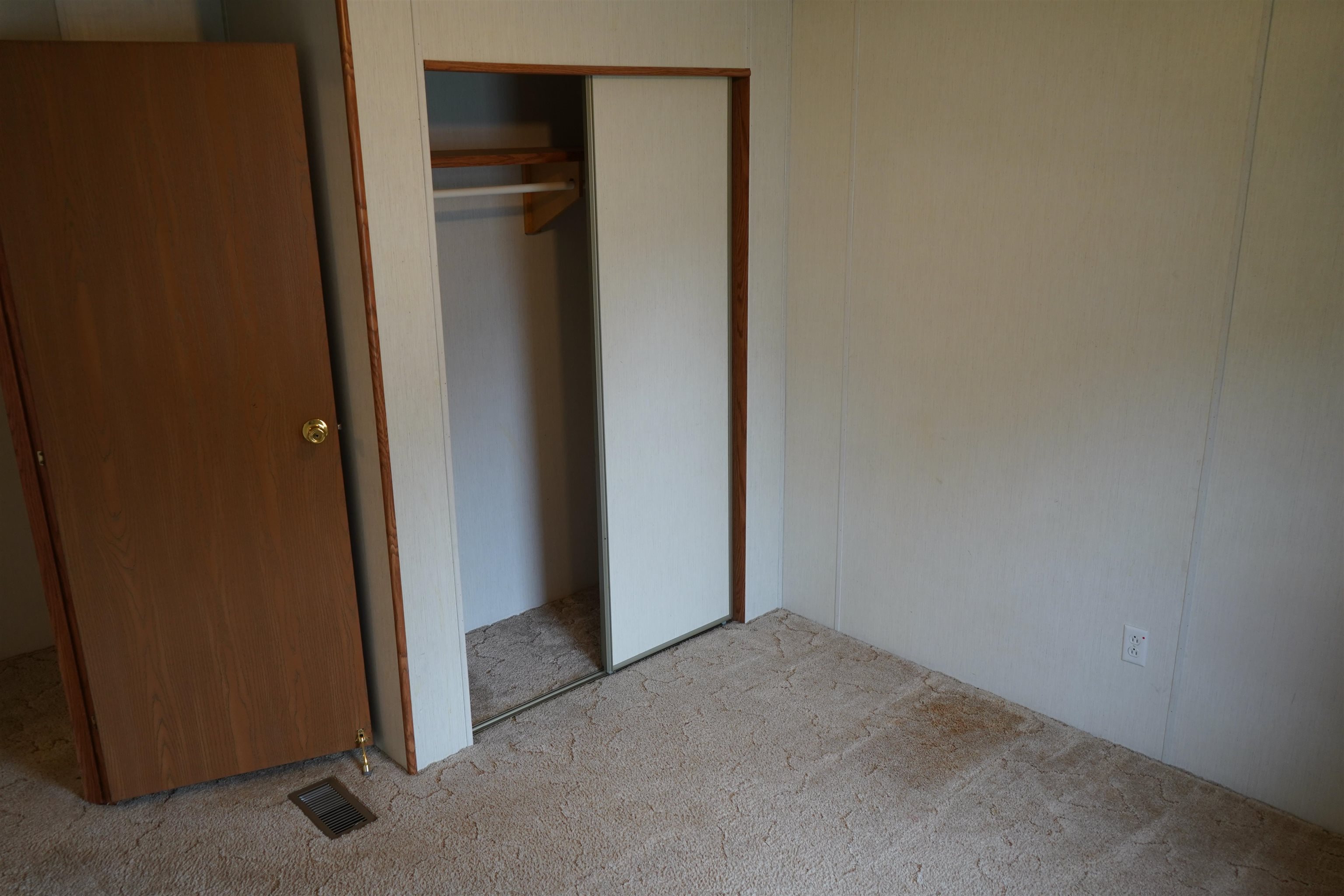 47 Coban Drive Duluth, MN 55808 - Photo 17 of 23 Unfurnished bedroom featuring carpet flooring and a closet