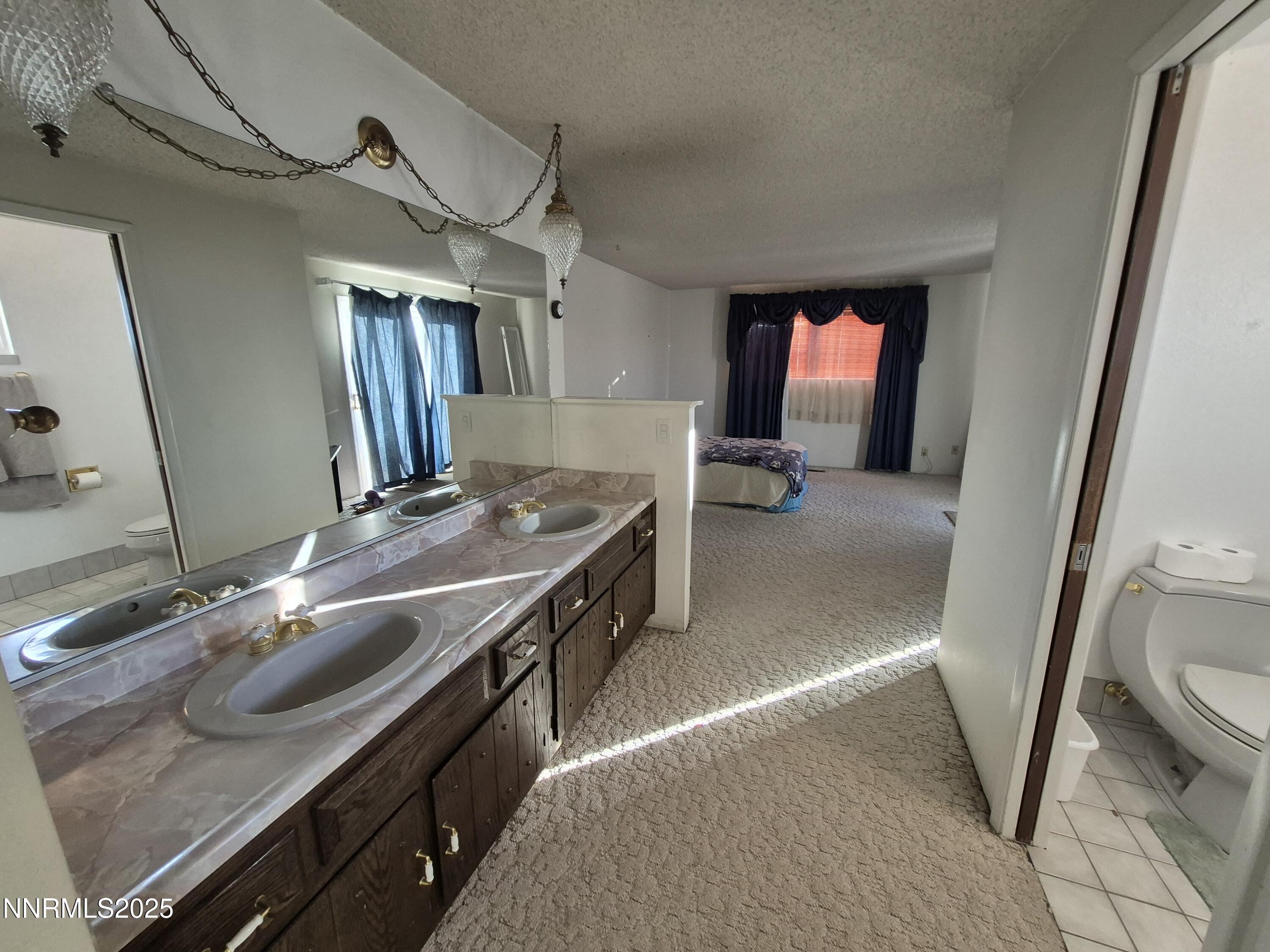 7215 Marlin Drive Reno, NV 89506 - Photo 15 of 40 a view of a livingroom with furniture window and wooden floor
