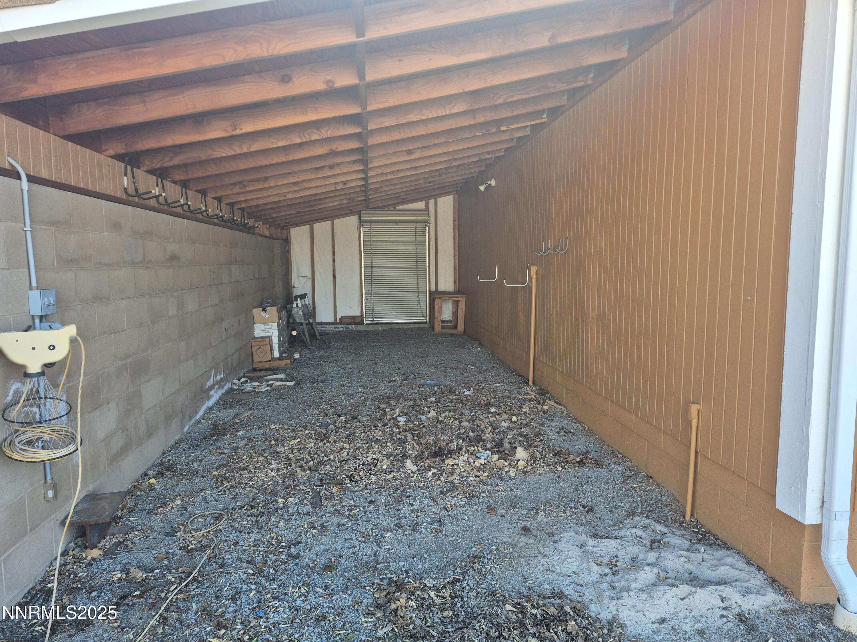 7215 Marlin Drive Reno, NV 89506 - Photo 29 of 40 a view of a room with a wooden roof and door