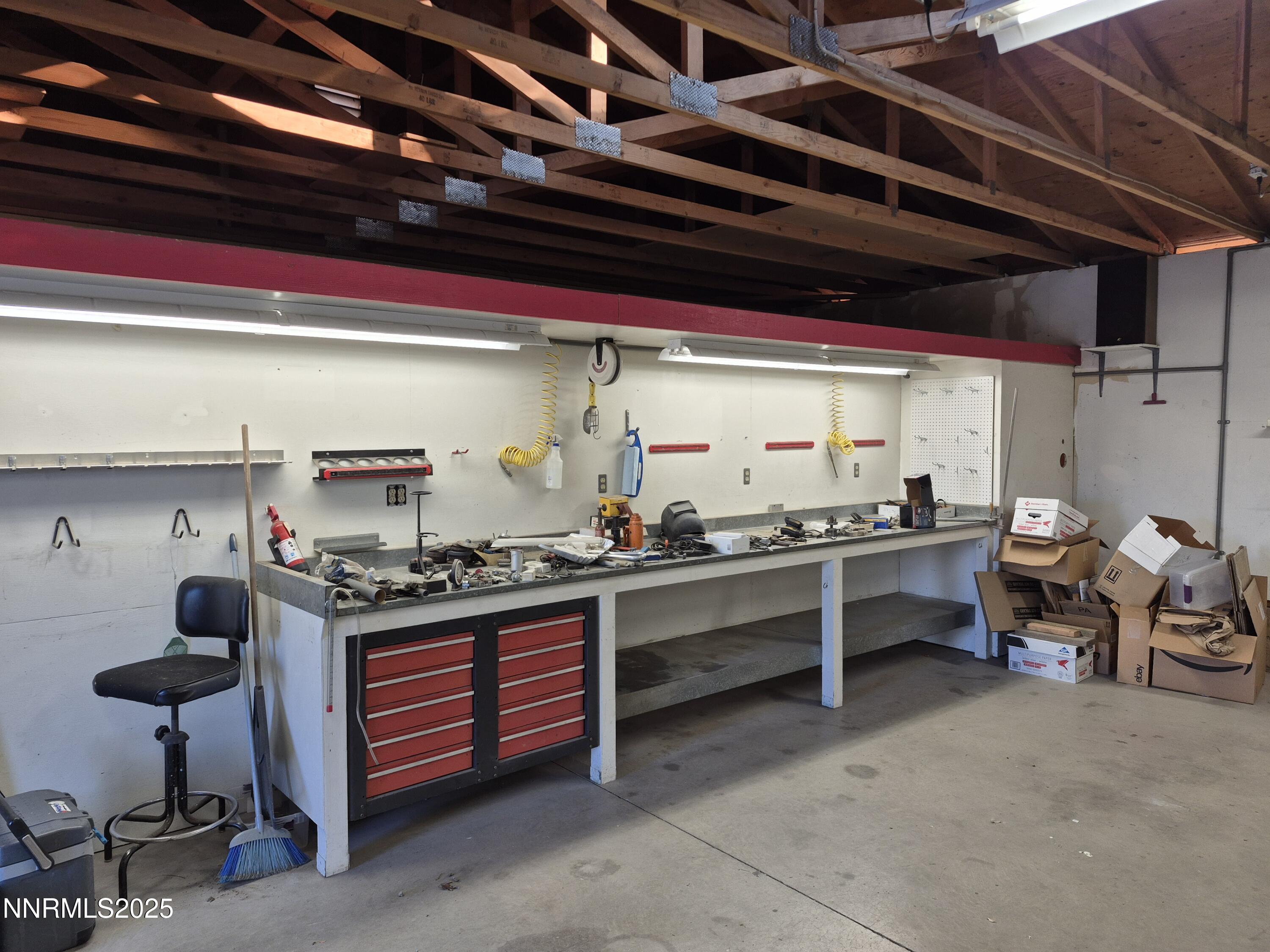 7215 Marlin Drive Reno, NV 89506 - Photo 30 of 40 a kitchen with stainless steel appliances granite countertop a sink and a stove