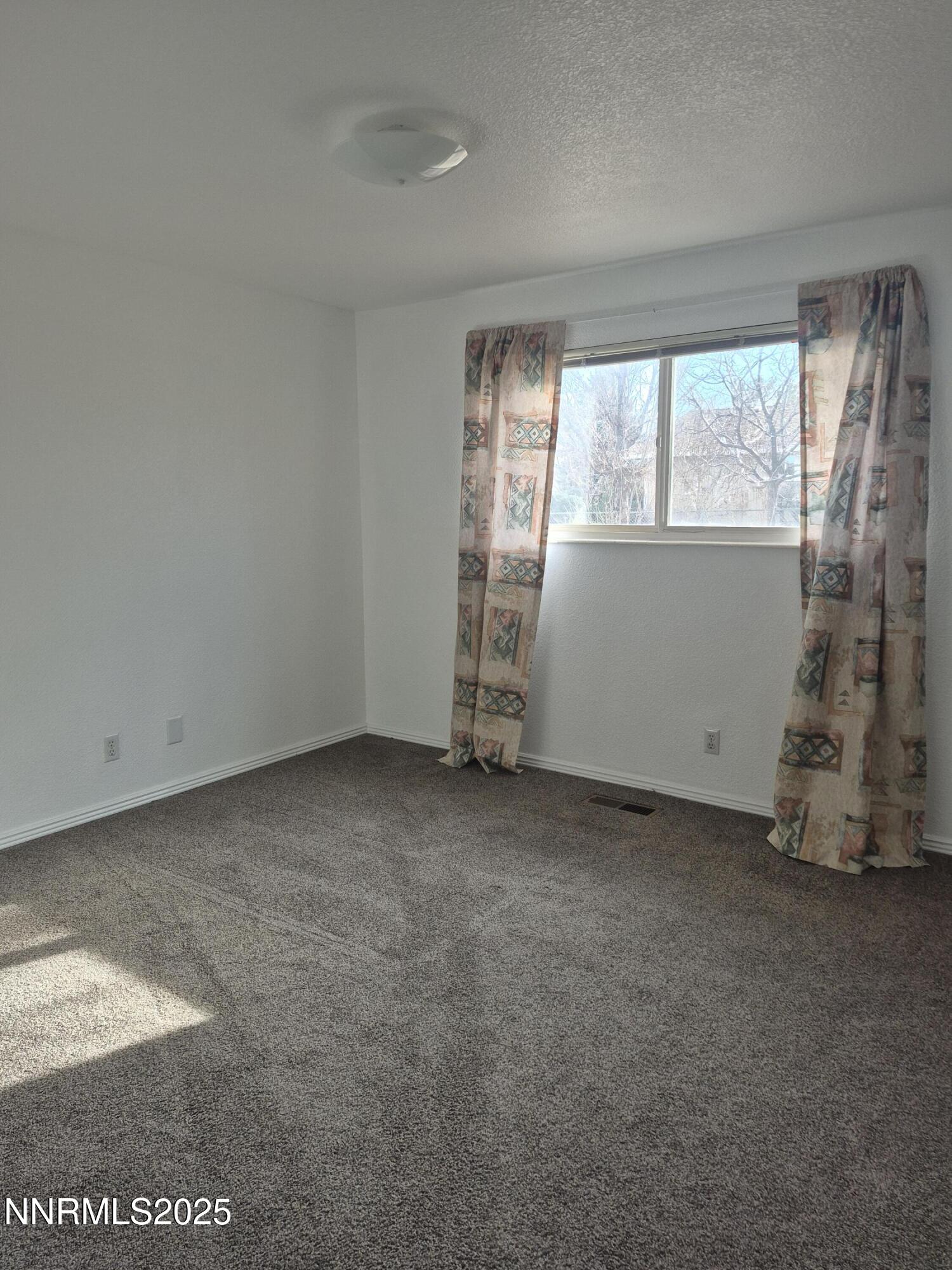 7215 Marlin Drive Reno, NV 89506 - Photo 10 of 40 a view of room with window