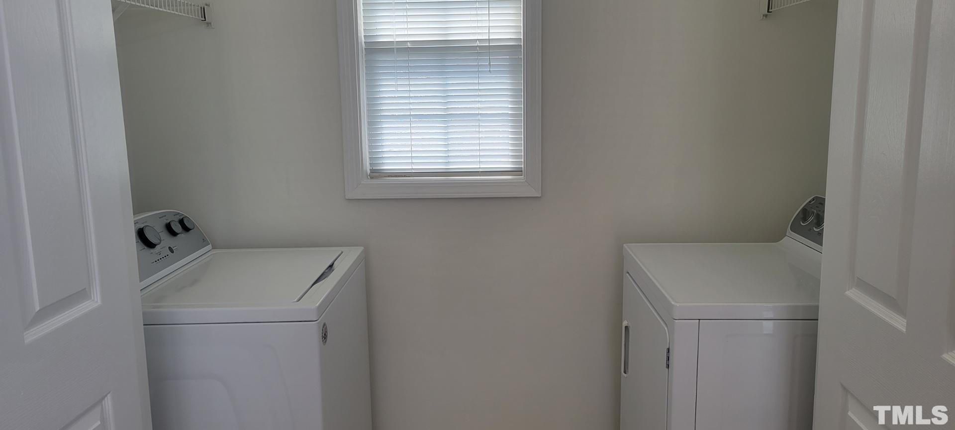 2511-301 Friedland Place Raleigh, NC 27617 - Photo 3 of 6 a bathroom with a sink and a toilet