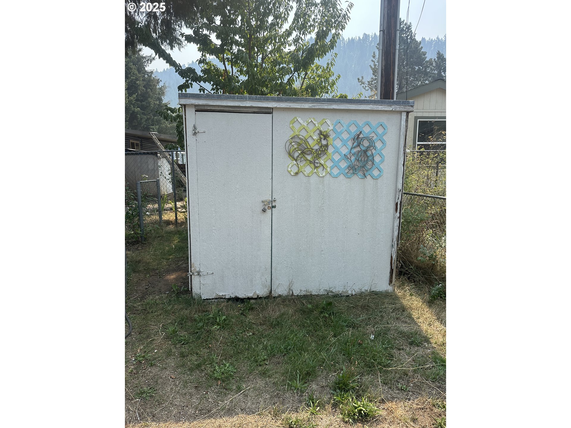 47775 Berry Street, Unit D6 Oakridge, OR 97463 - Photo 16 of 18 a view of door with wooden wall