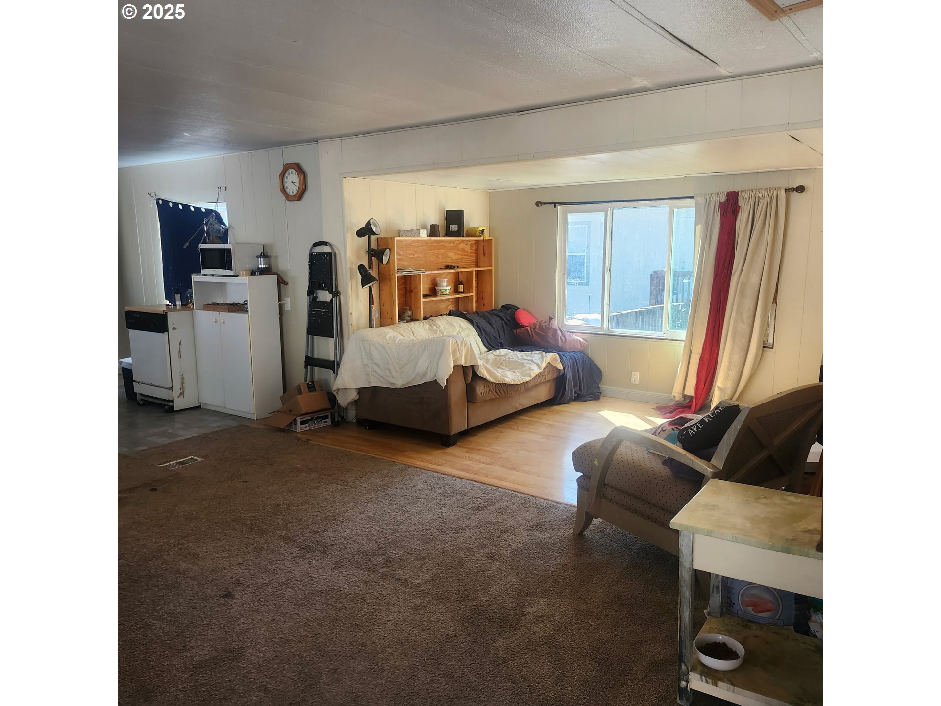 47775 Berry Street, Unit D6 Oakridge, OR 97463 - Photo 18 of 18 a living room with furniture and a window