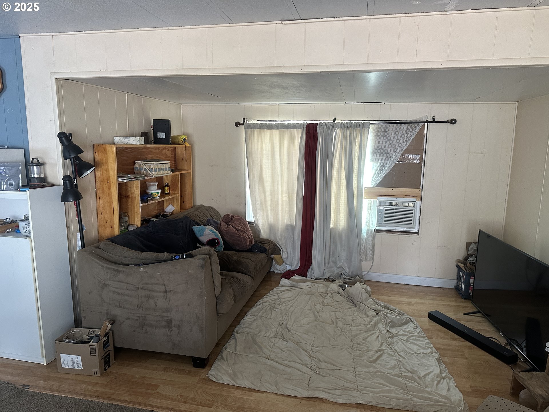 47775 Berry Street, Unit D6 Oakridge, OR 97463 - Photo 7 of 18 a living room with furniture and a window