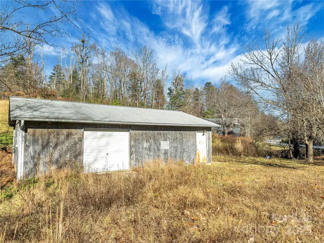 an aerial view of residential house with outdoor space