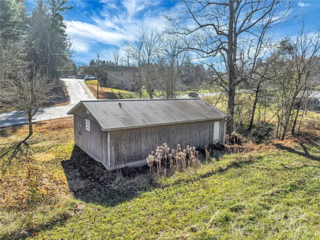 a view of a backyard of the house