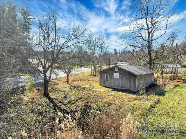 a view of backyard of house
