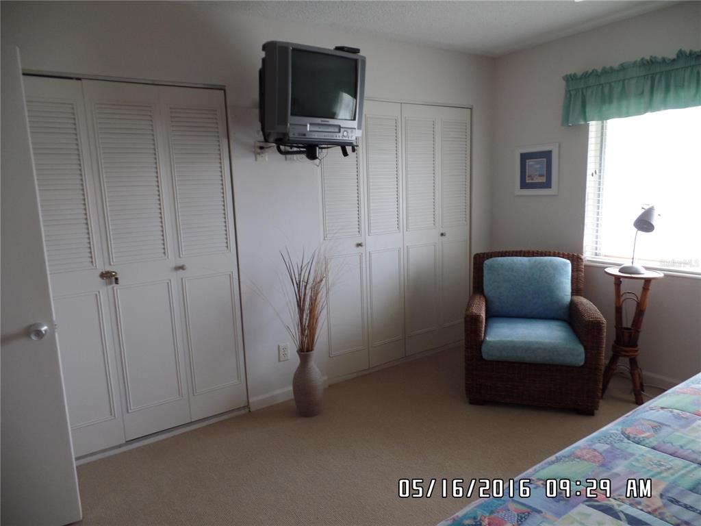 815 Ocean Shore Boulevard, Unit 9A Ormond Beach, FL 32176 - Photo 7 of 9 a view of workspace with furniture and a window