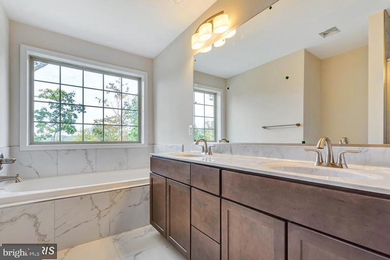 6722 Hemlock Point Road New Market, MD 21774 - Photo 7 of 9 Master Bath with dual vanities