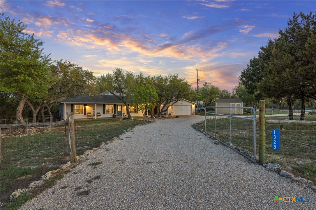 1328 Cottonwood Road Fischer, TX 78623 - Photo 9 of 35 a view of a park with large trees
