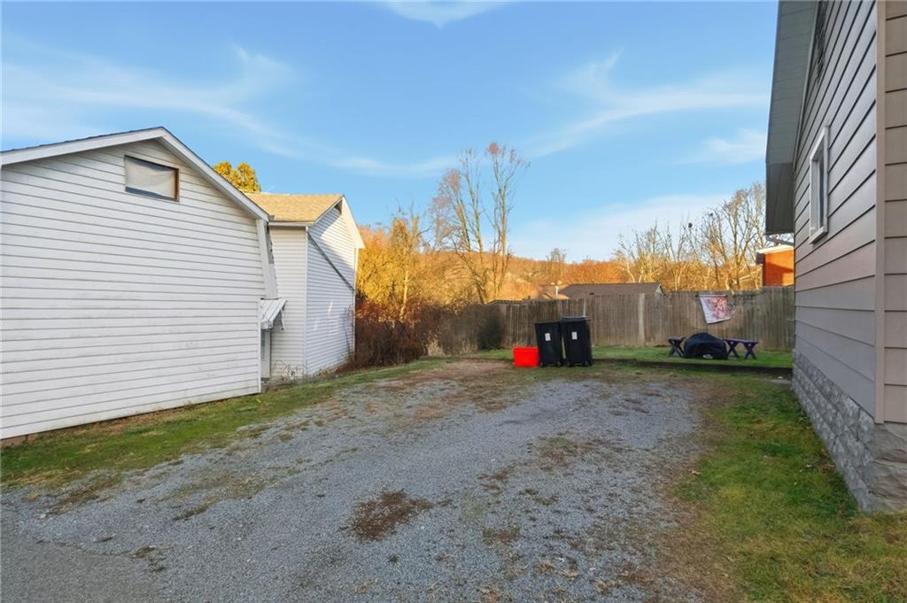 518 Cross Street Rochester, PA 15074 - Photo 20 of 24 a view of a house with a yard