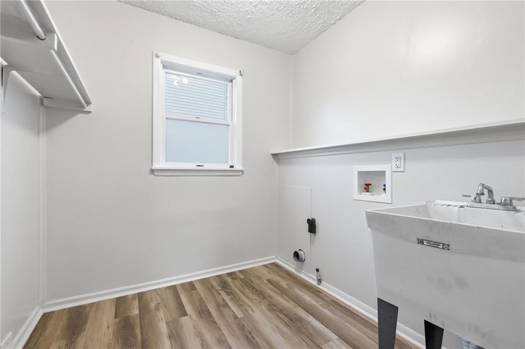 518 Cross Street Rochester, PA 15074 - Photo 10 of 24 a room with a window and a ceiling fan