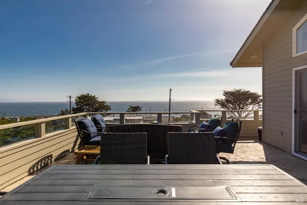a view of a terrace with sitting area