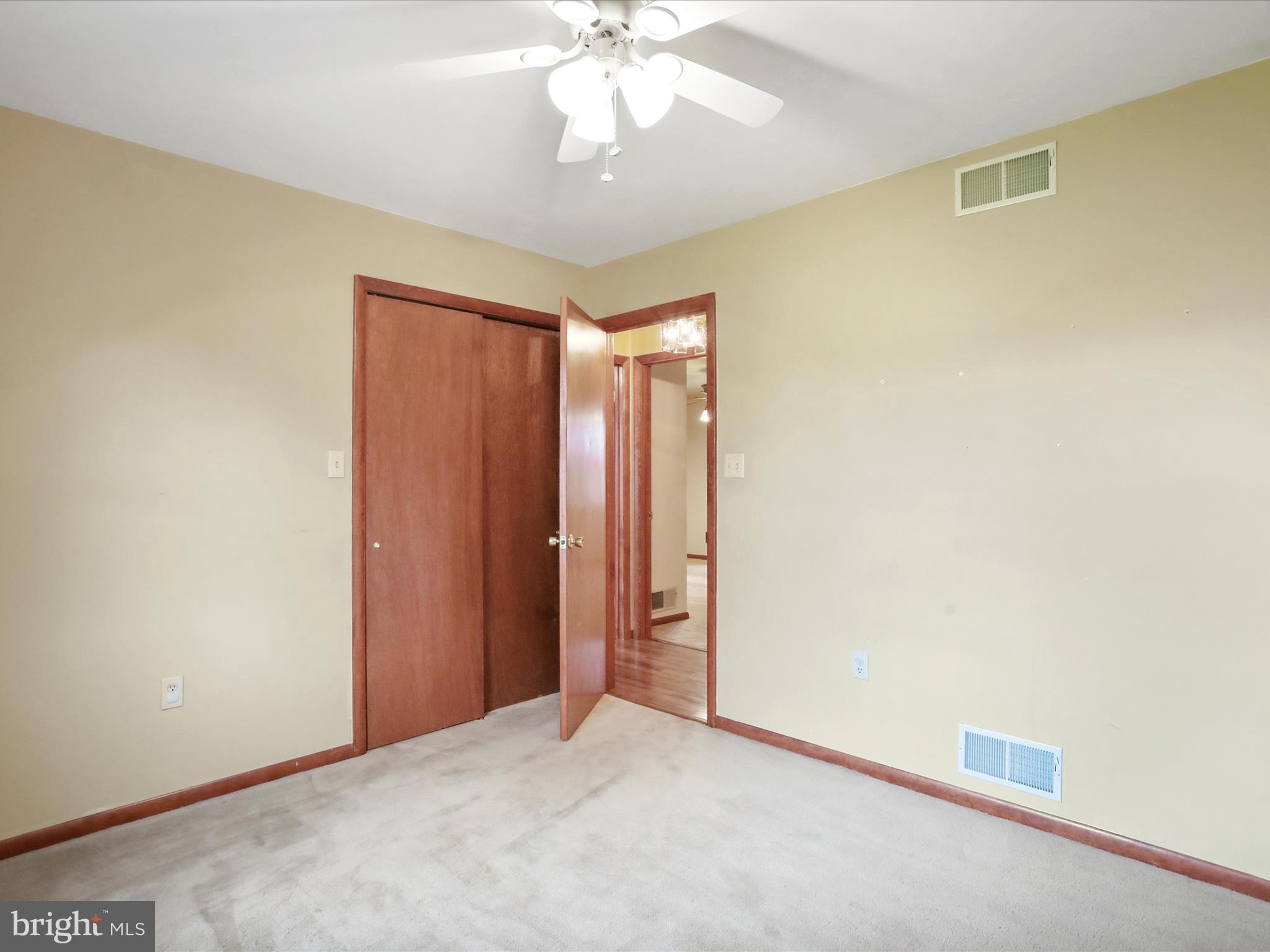 47 Diffys Drive Shippensburg, PA 17257 - Photo 16 of 48 a view of a room with a ceiling fan and a window