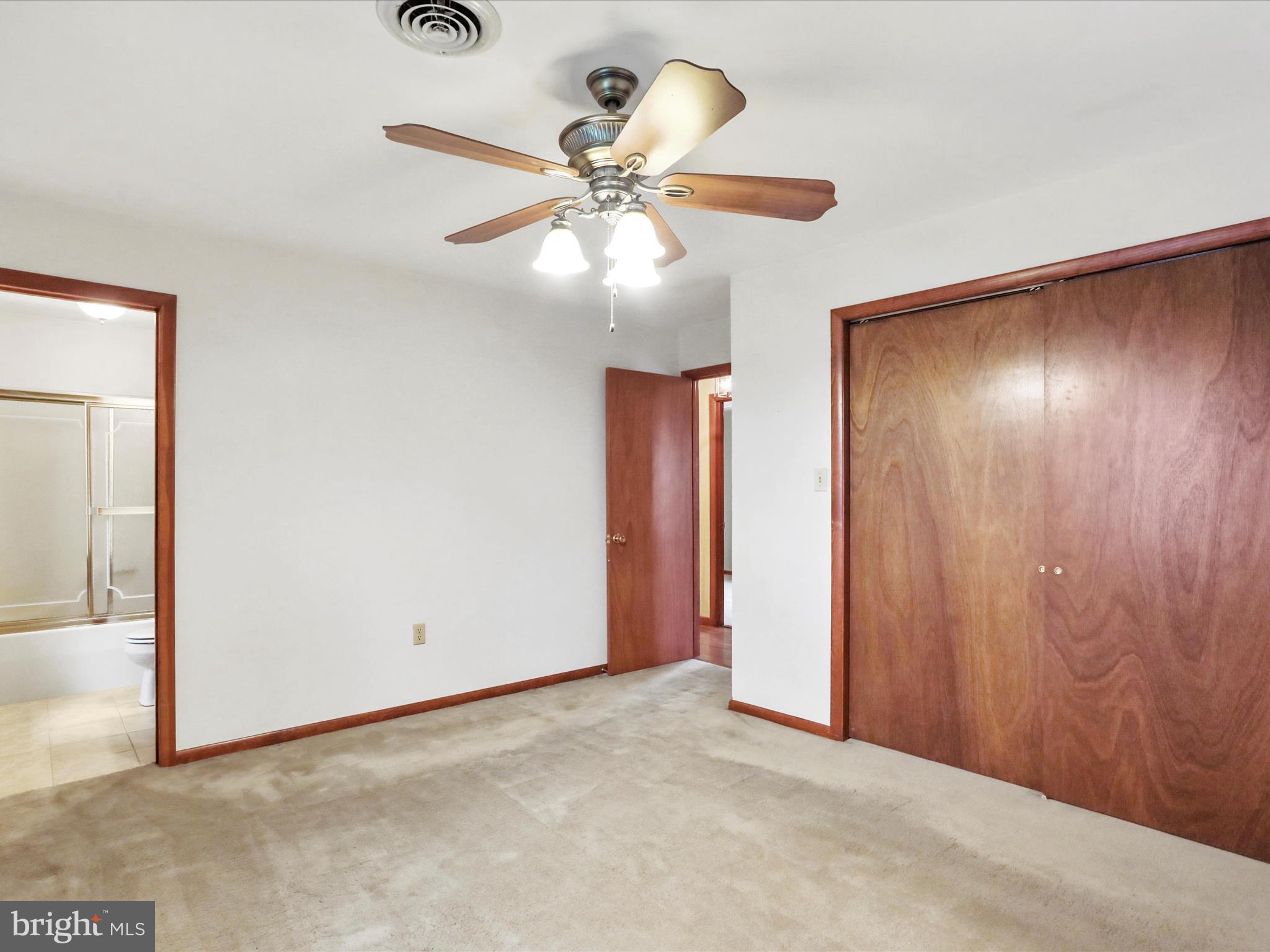 47 Diffys Drive Shippensburg, PA 17257 - Photo 20 of 48 an empty room with fan and entrance