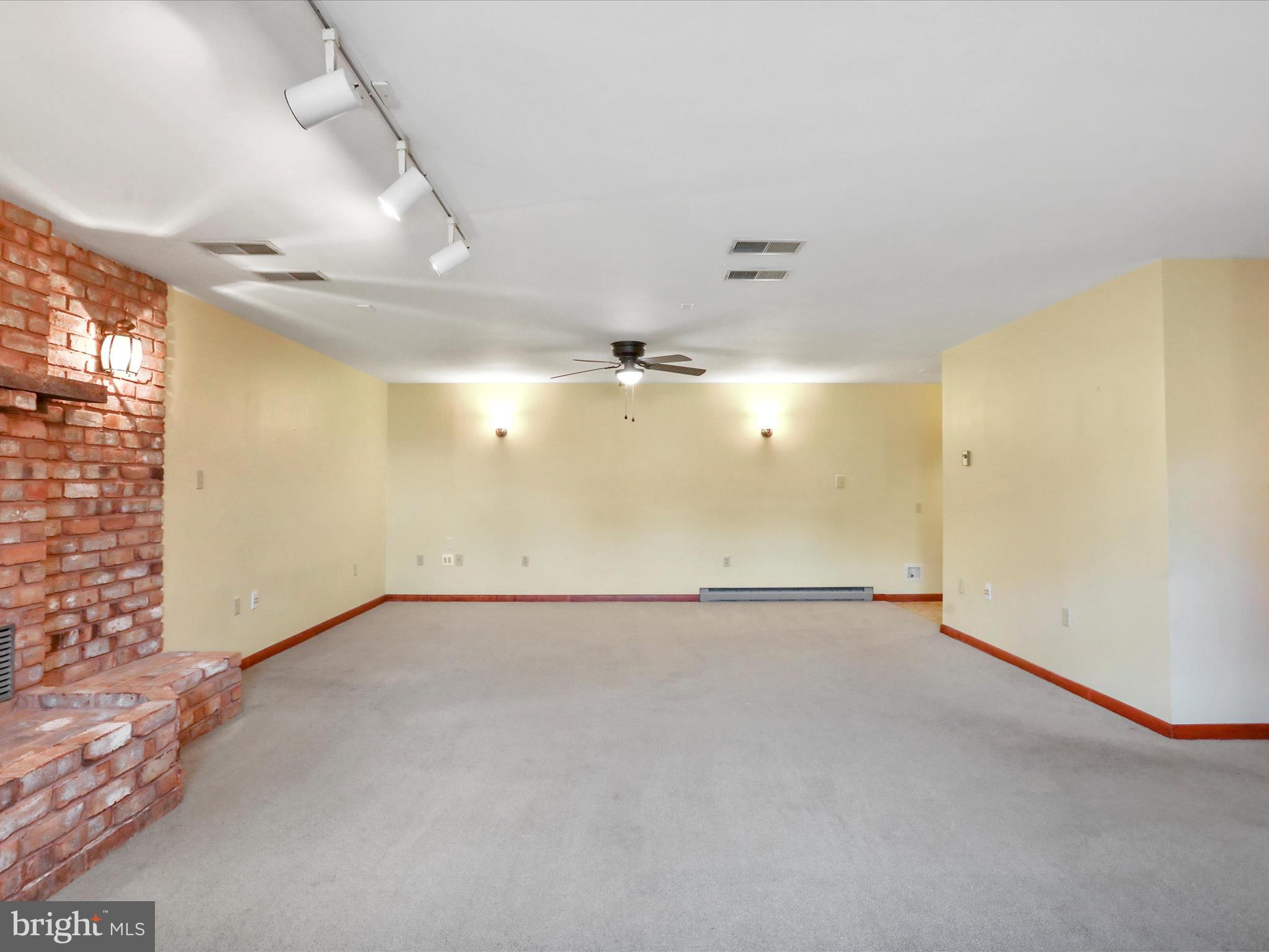 47 Diffys Drive Shippensburg, PA 17257 - Photo 25 of 48 an empty room with a empty space and a ceiling fan