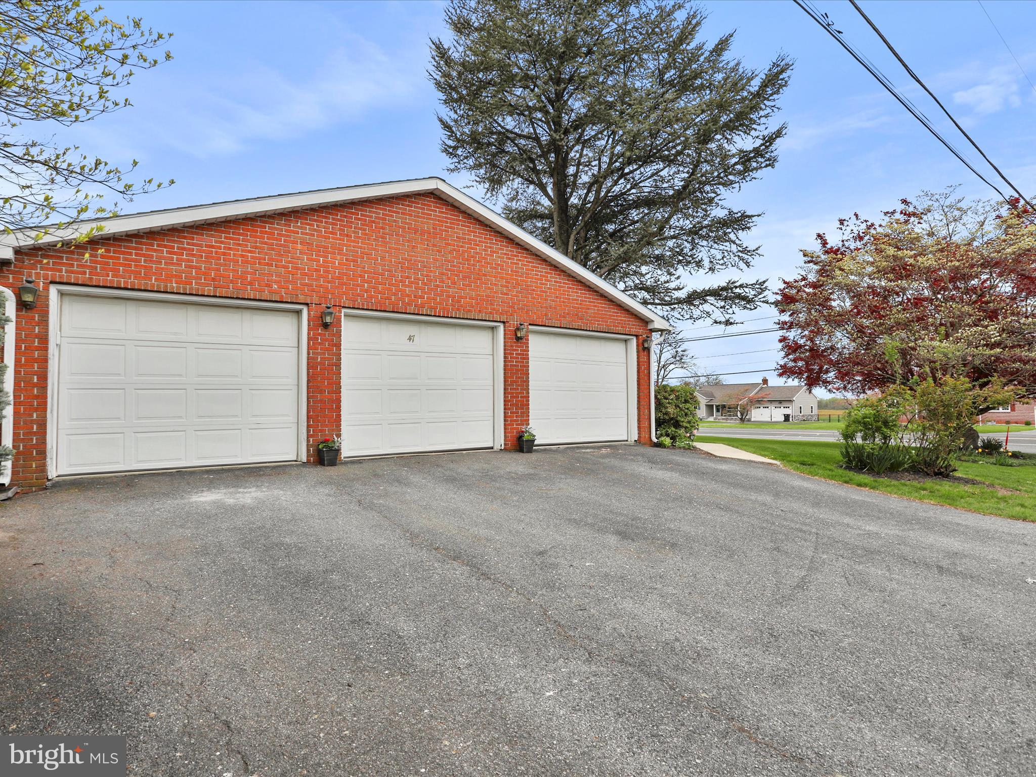 47 Diffys Drive Shippensburg, PA 17257 - Photo 36 of 48 a view of a house with a yard and garage