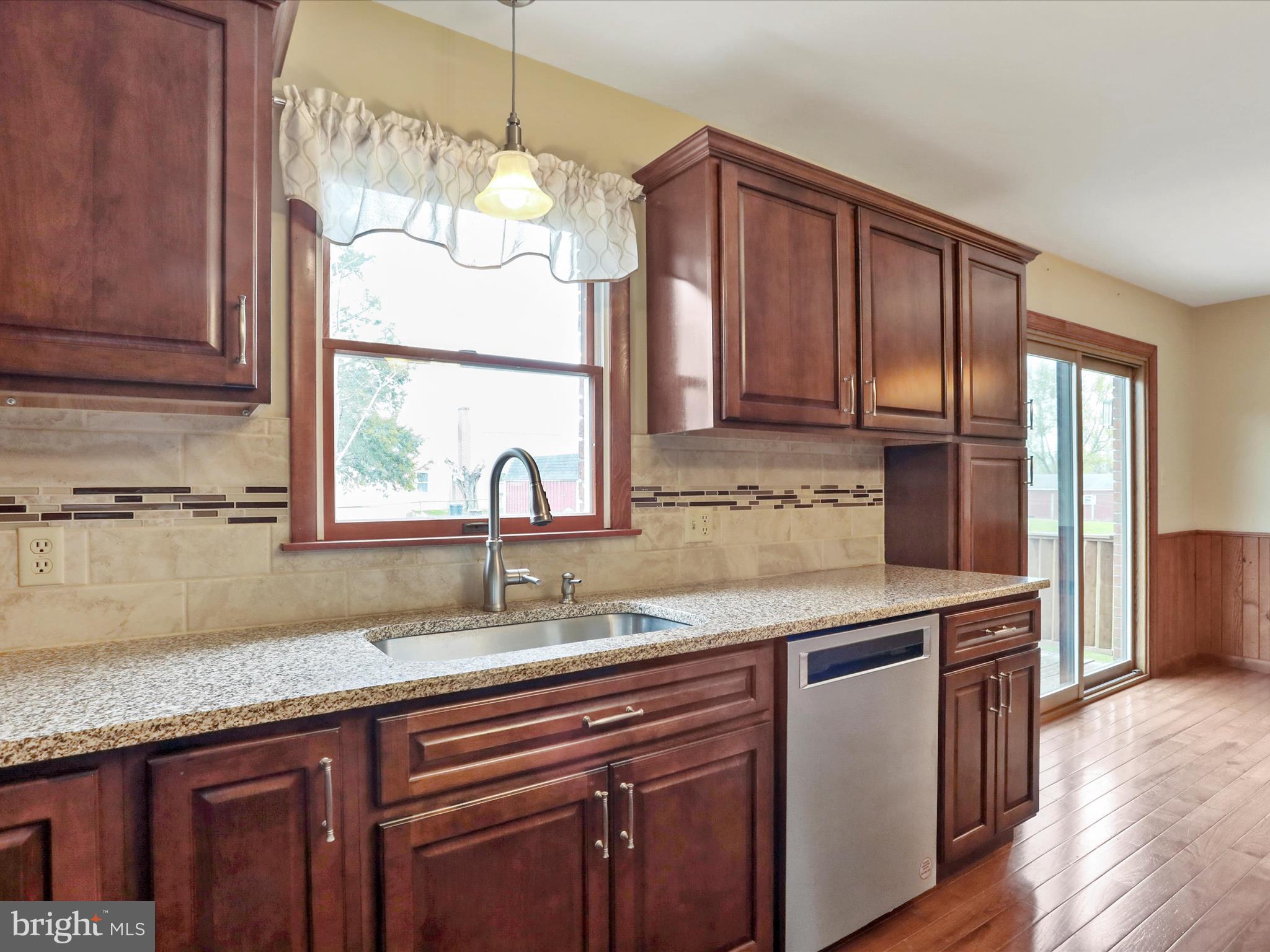 47 Diffys Drive Shippensburg, PA 17257 - Photo 6 of 48 a kitchen with granite countertop stainless steel appliances a sink and a window