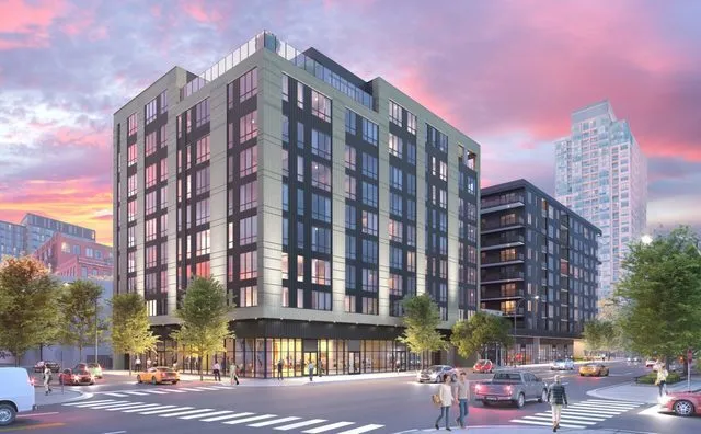 a view of a tall building from a street