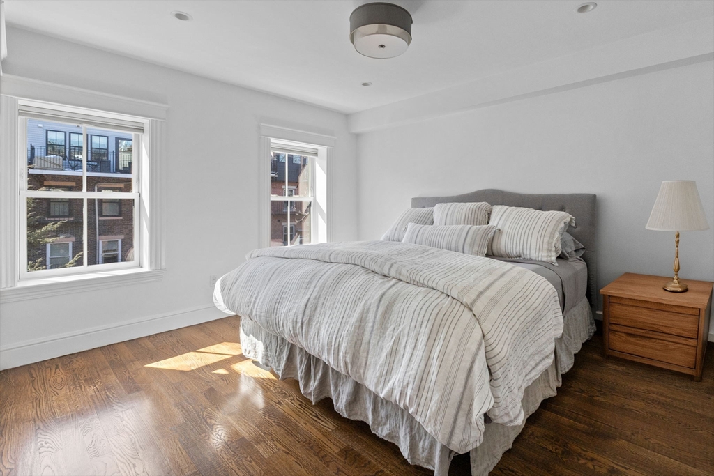 34 Dwight Street, Unit 2 Boston, MA 02118 - Photo 11 of 22 a bedroom with bed and window