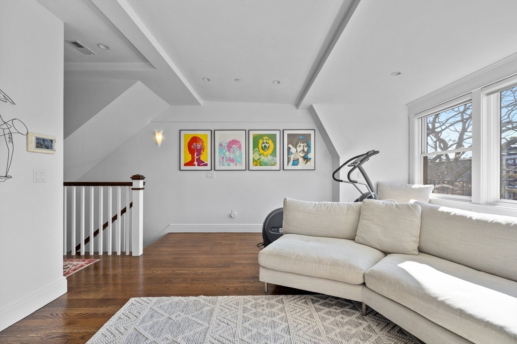 34 Dwight Street, Unit 2 Boston, MA 02118 - Photo 19 of 22 a living room with furniture and wooden floor