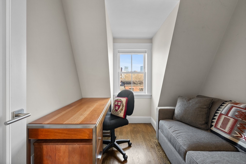34 Dwight Street, Unit 2 Boston, MA 02118 - Photo 21 of 22 a living room with a couch