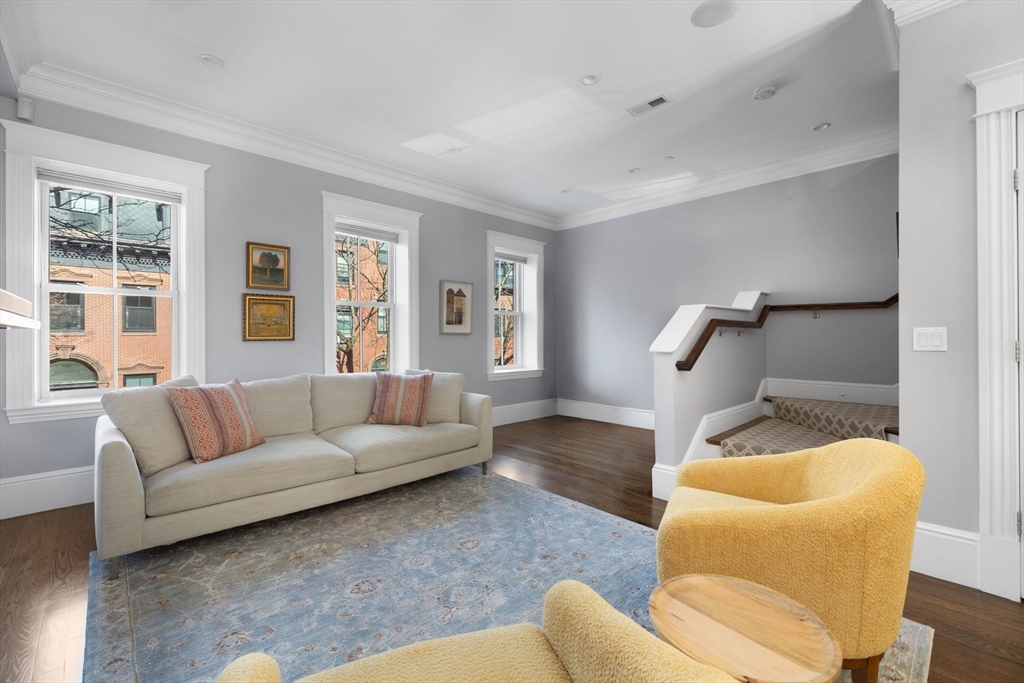 34 Dwight Street, Unit 2 Boston, MA 02118 - Photo 7 of 22 a living room with furniture and a couch