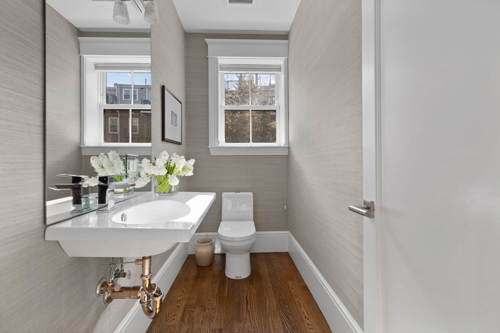 34 Dwight Street, Unit 2 Boston, MA 02118 - Photo 10 of 22 a bathroom with a sink toilet and a window