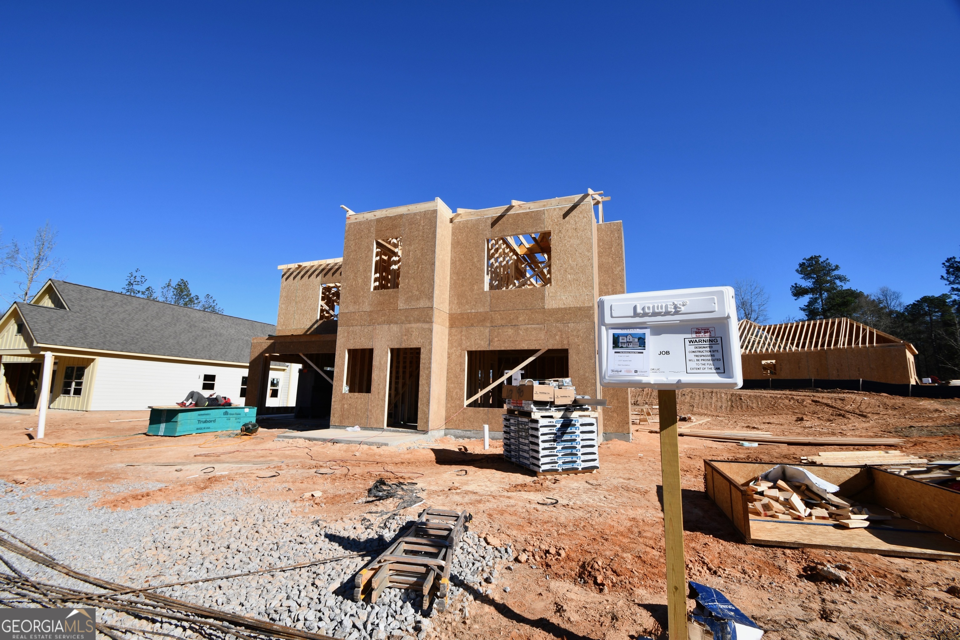 a front view of a building with seating area